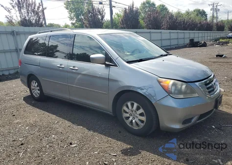 2010 Honda Odyssey Ex z USA, uszkodzony, nr VIN 5FNRL3H54AB011795